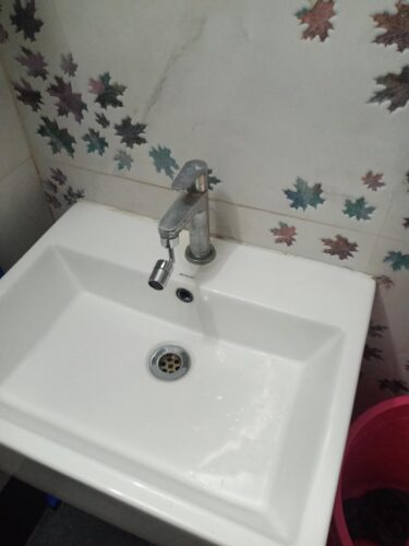 720° Rotating Faucet Aerator — Fits All Taps | Splash + Shower Mode | Water Saving photo review